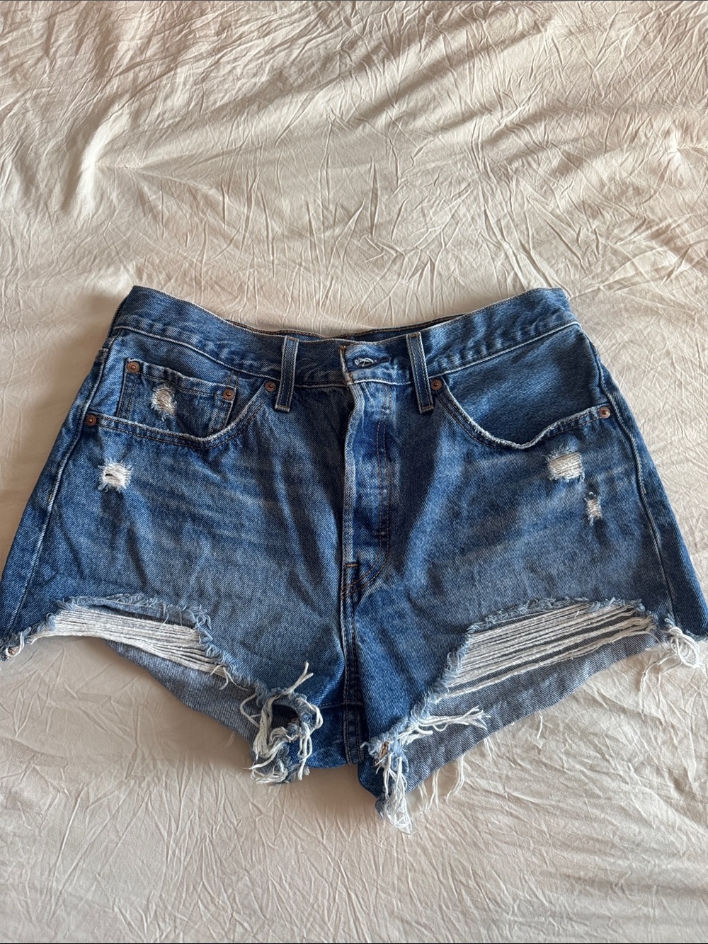 Levi's Distressed Dark Blue Cutoff Jean Shorts